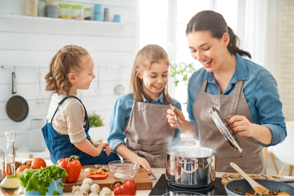 Mom and daughters cooking emergency food